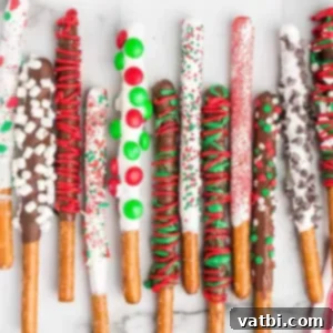 Festive Candy Treats 7 Christmas Chocolate Covered Pretzel Rods, a sweet and salty treat, perfect as homemade gifts.