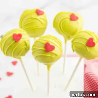 Festive Candy Treats 9 Grinch Cake Pops, a fun and easy Christmas dessert made with simple ingredients.