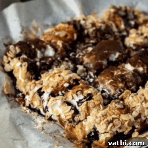 Marshmallow Fluff Delights 5 Caramel Marshmallow Brownies topped with crispy rice and a drizzle of caramel.