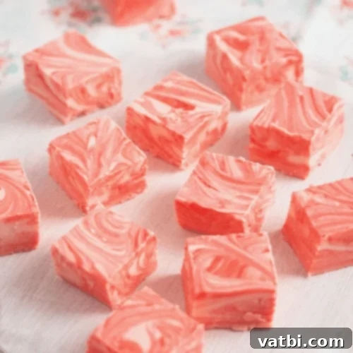 Marshmallow Fluff Delights 26 Beautiful pink Strawberry Fudge with Marshmallow Fluff, cut into squares.
