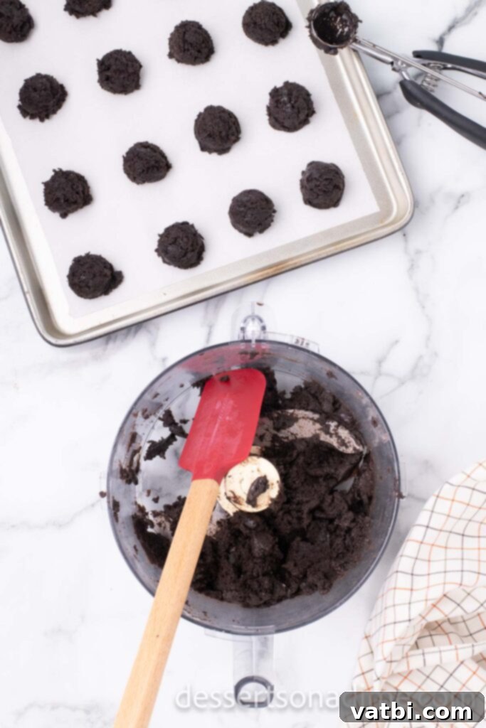 Touchdown Oreo Truffles 5 The combined Oreo and cream cheese mixture in a food processor, scraped down with a spatula, ready for shaping.