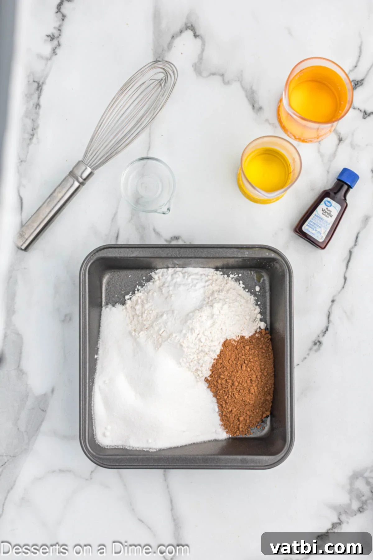 Crazy Simple Cake 4 Baking dish with dry ingredients for crazy cake, perfectly combined.