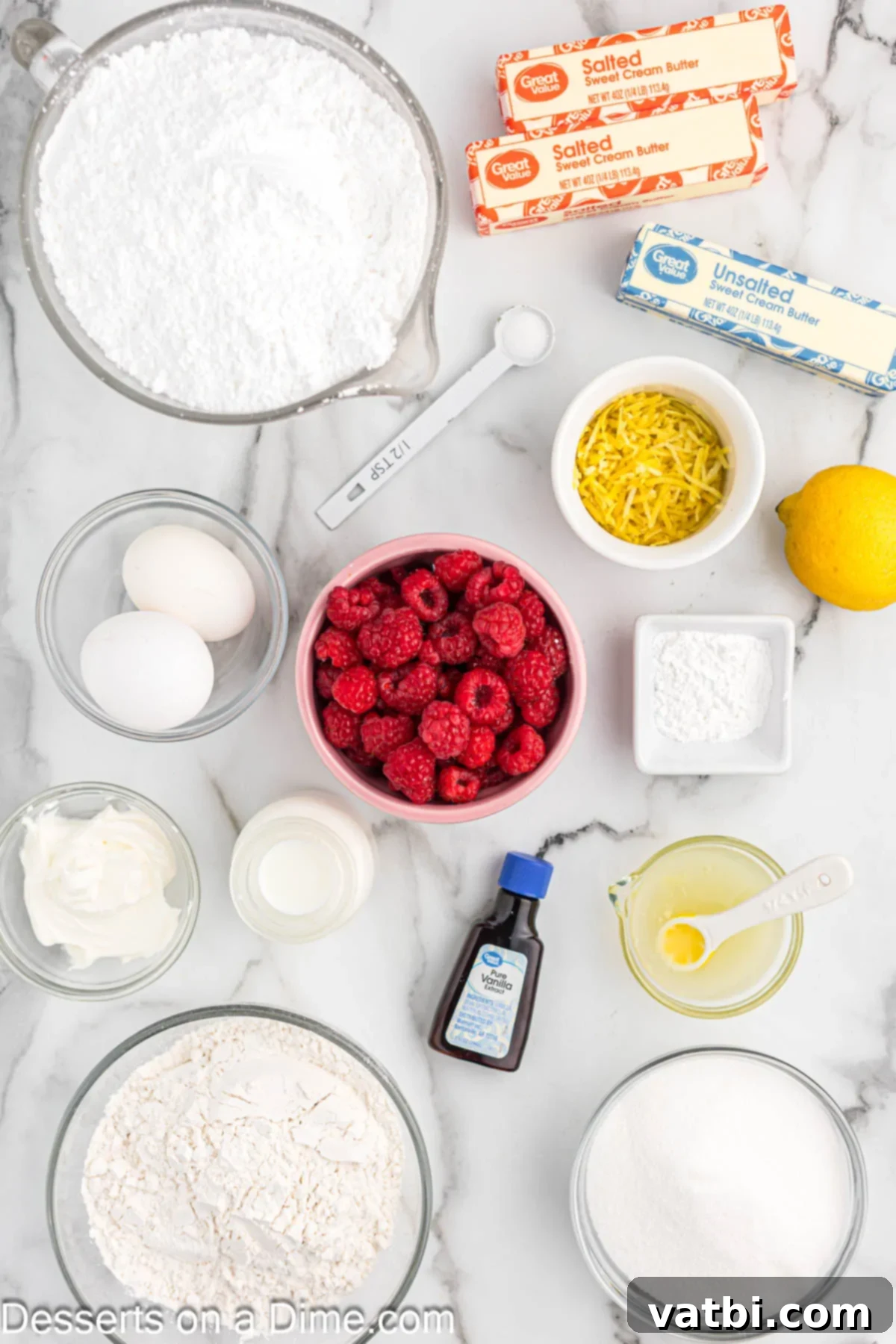 Sun-Kissed Lemon Raspberry Treats 3 Ingredients for Lemon raspberry cupcakes: flour, butter,sugar, eggs, vanilla, lemon uice, lemon zest, milk, sour cream, raspberries, lemon juice, butter and powdered sugar.