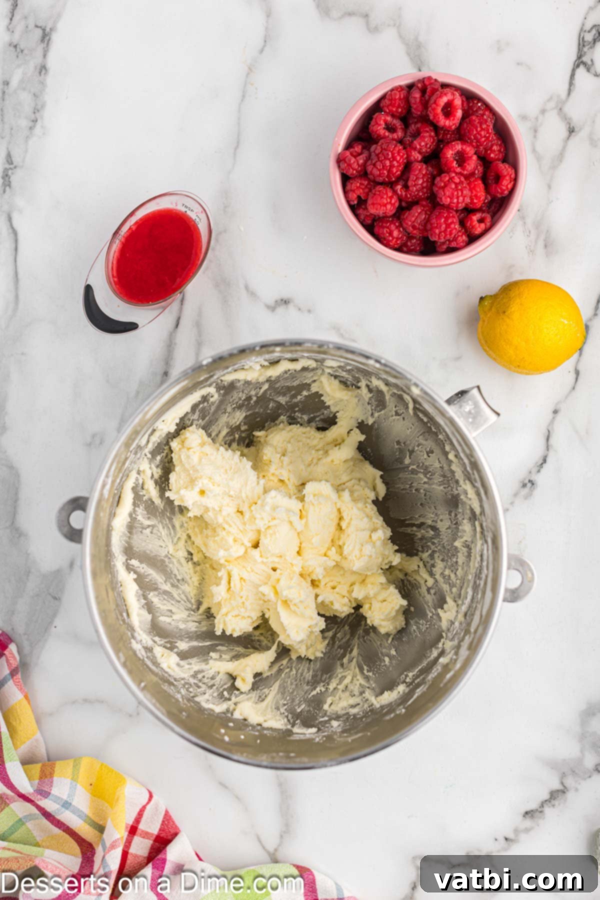 Sun-Kissed Lemon Raspberry Treats 9 Mixing bowl with butter and powdered sugar combined.