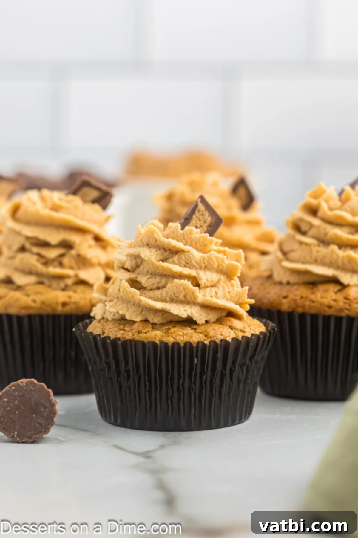 Heavenly Peanut Butter Cupcakes 12 Peanut Butter cupcakes on a platter.
