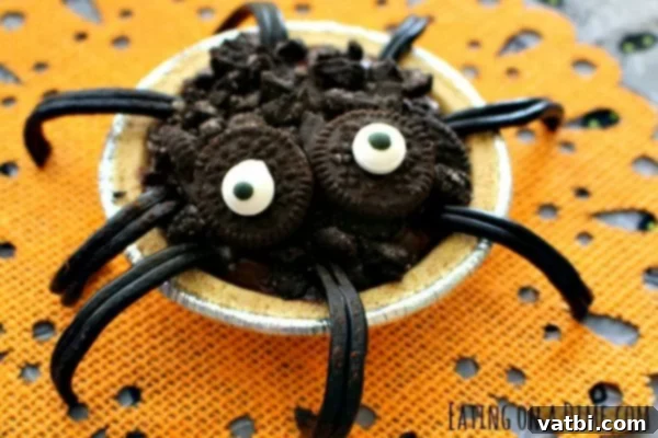 A spider cookie with eyes and googly eyes.