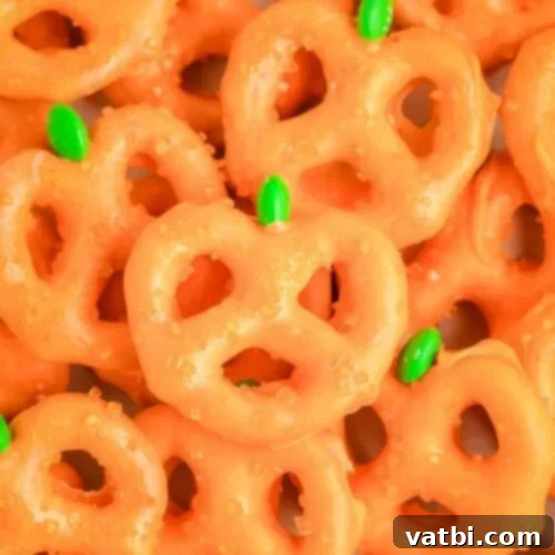 Pumpkin pretzels are a fun treat for halloween.