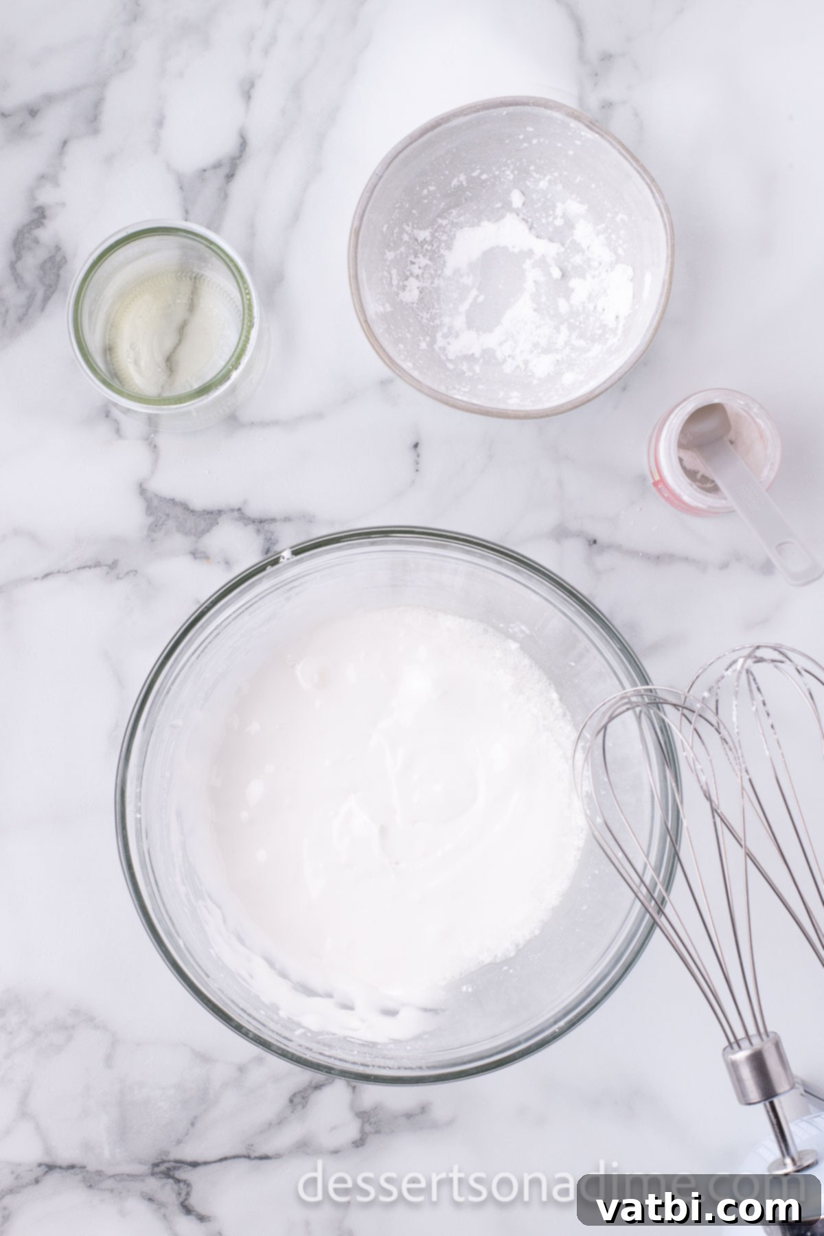 Magical Mickey Bakes 4 Dry ingredients for cookies in a mixing bowl, ready to be whisked together.