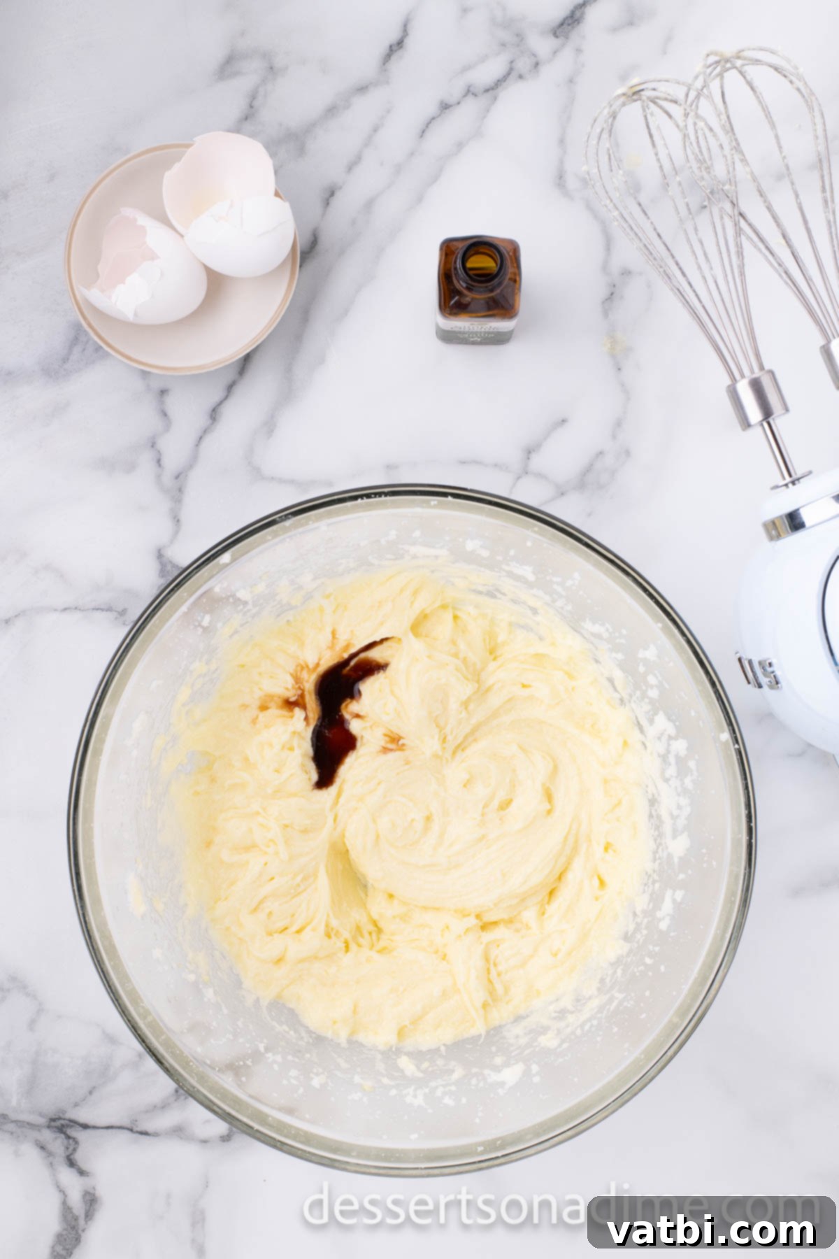 Magical Mickey Bakes 5 Separate mixing bowl with softened butter and granulated sugar being creamed together.