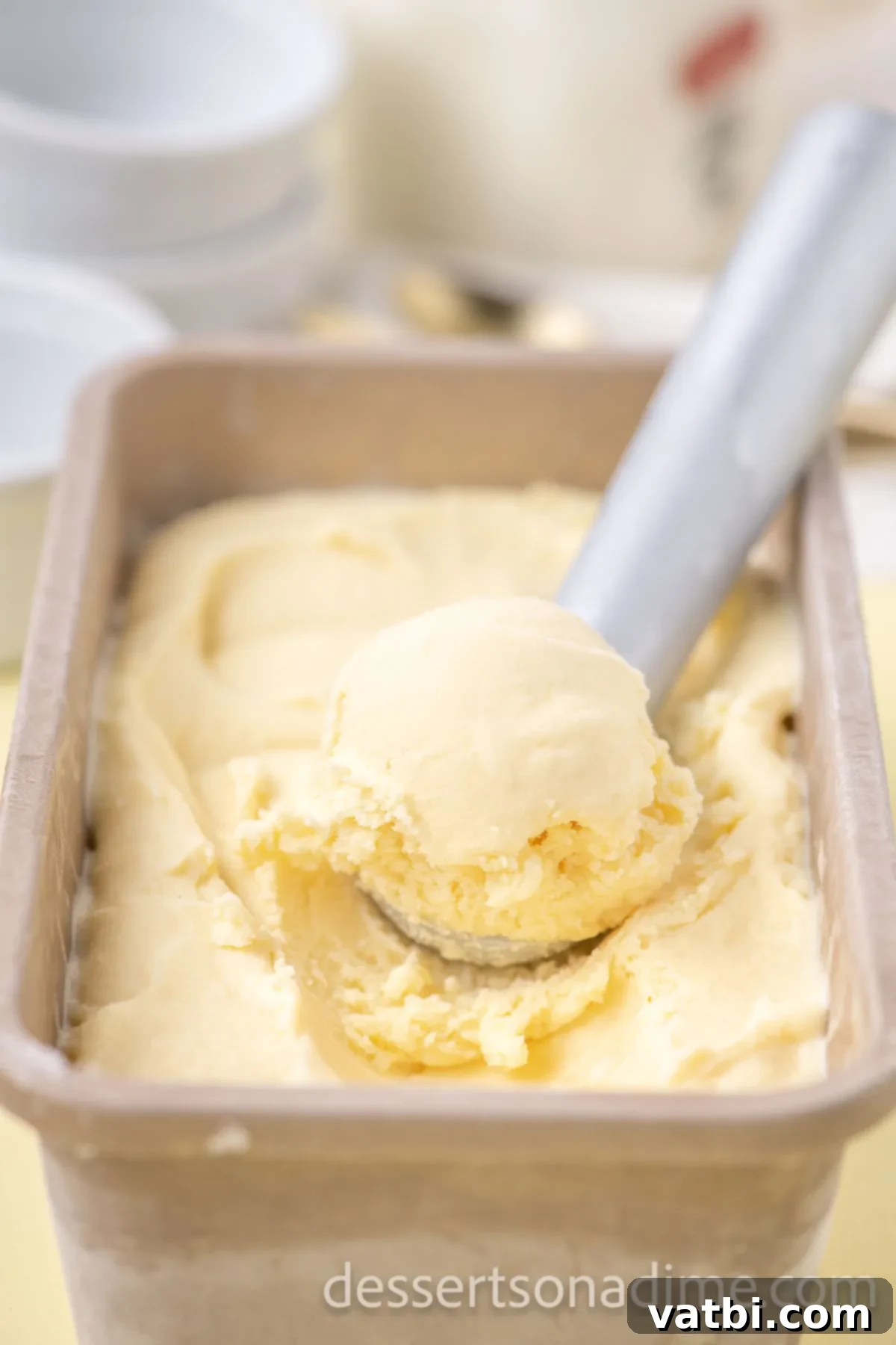 Your Own Scoop of Gelato Heaven 14 A smooth, creamy homemade gelato in a loaf pan, perfectly frozen and ready to be scooped.