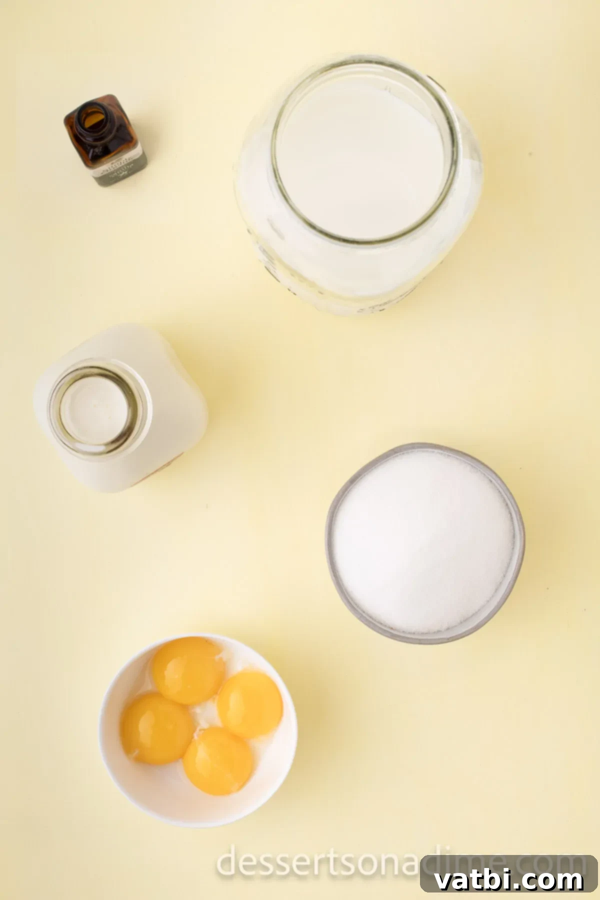 Your Own Scoop of Gelato Heaven 3 Ingredients laid out for homemade gelato: whole milk, heavy cream, large egg yolks, granulated sugar, and vanilla extract.
