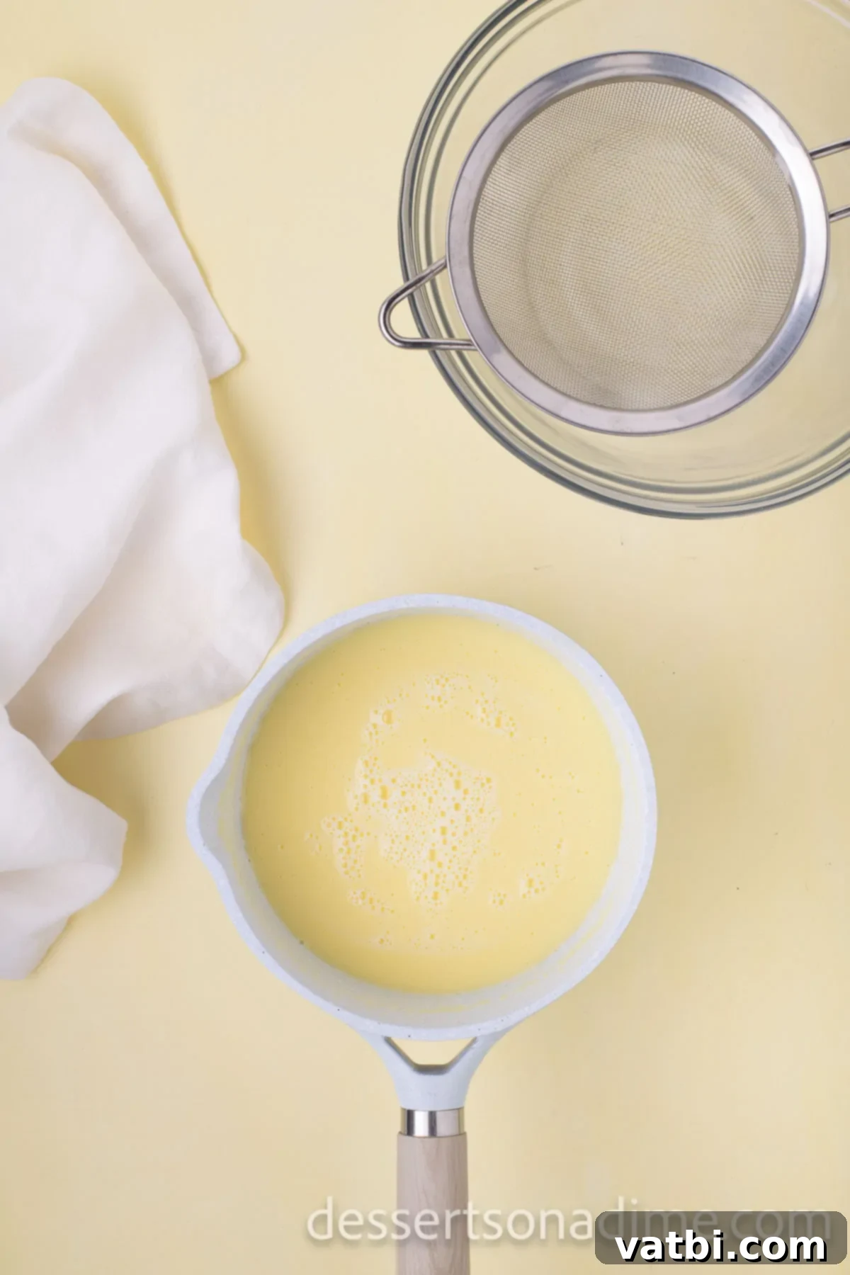 Your Own Scoop of Gelato Heaven 7 The combined egg and milk mixture poured back into the saucepan, being stirred as it thickens over low heat.