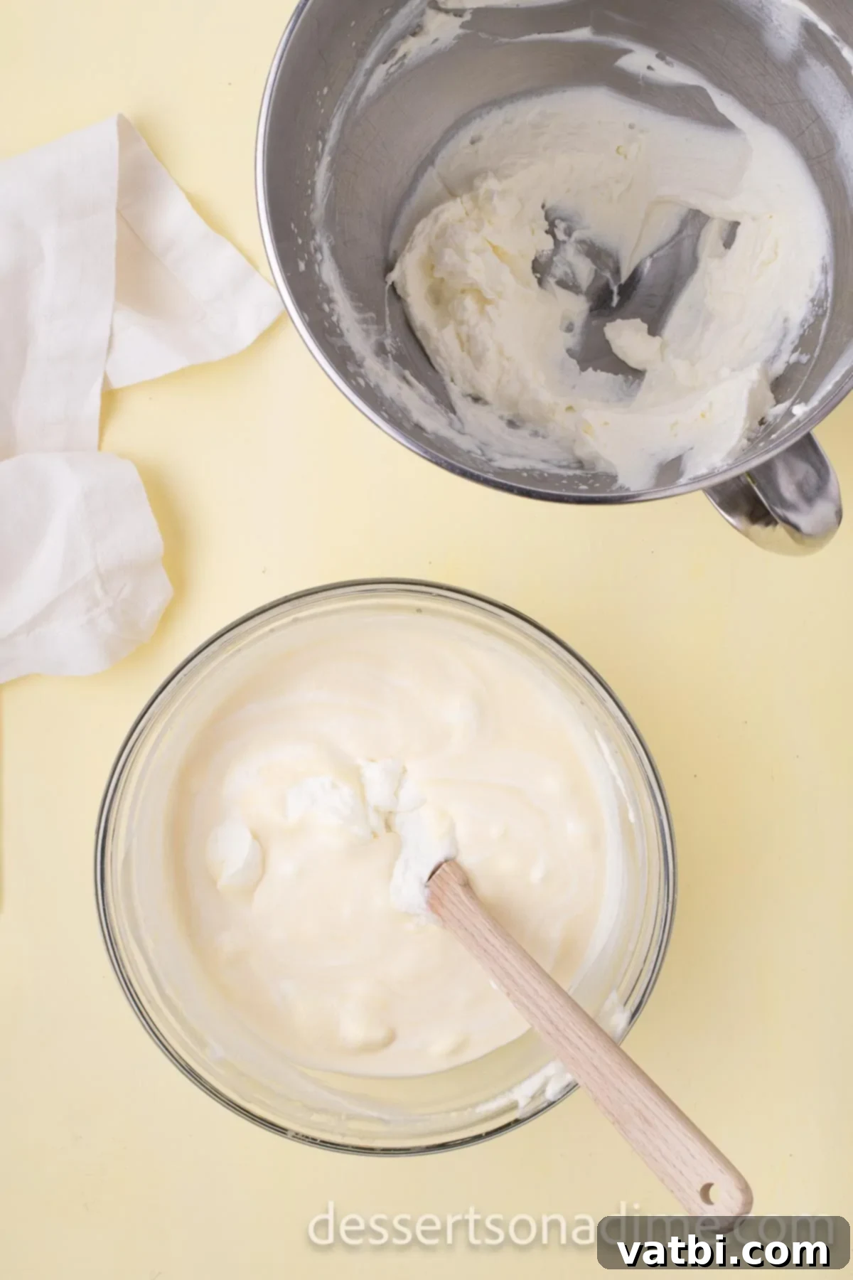 Your Own Scoop of Gelato Heaven 10 Chilled custard gently folded into whipped cream in a mixing bowl until smooth and fully combined, preserving airiness.
