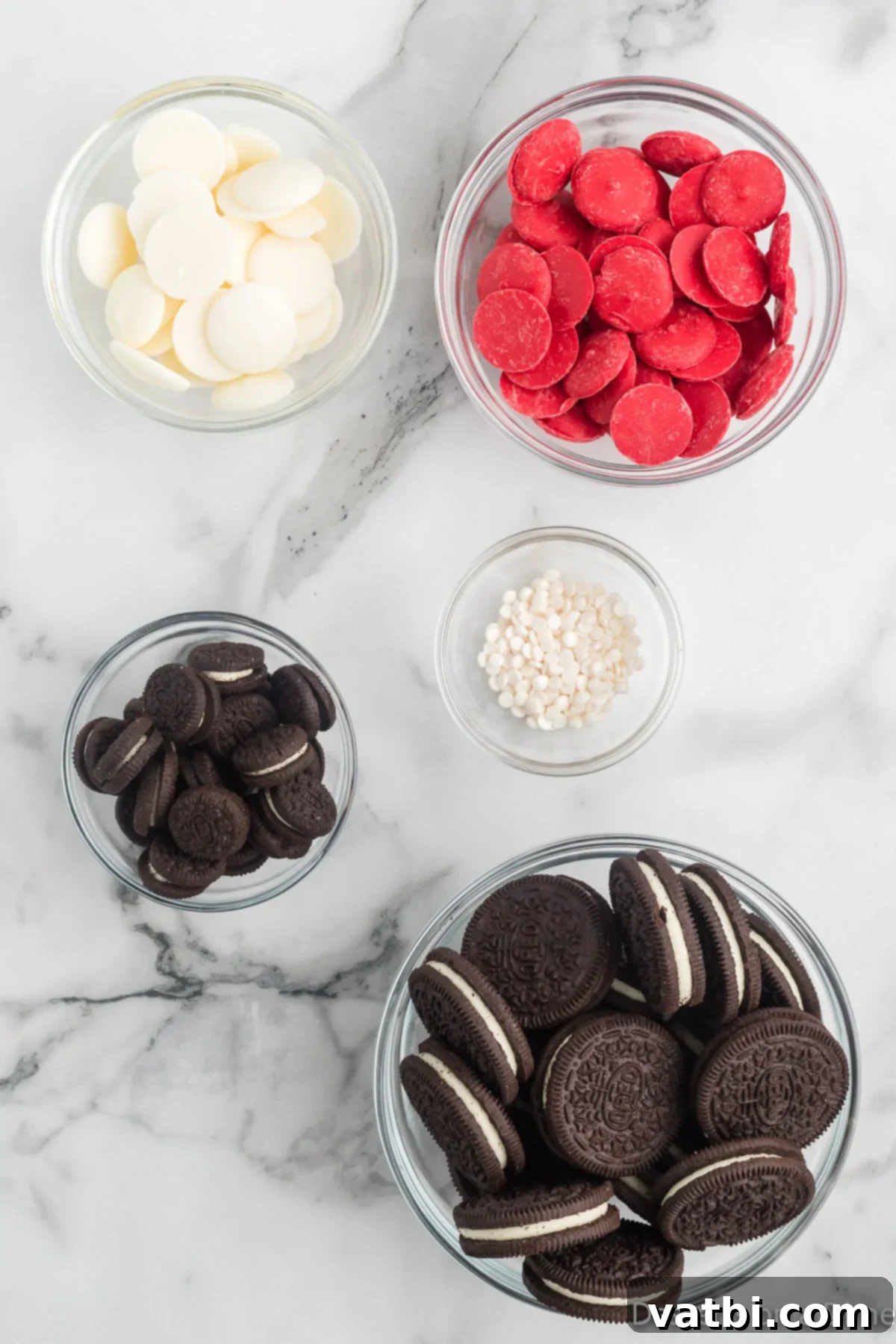 Disney Mickey Mouse Oreo Treats 3 Ingredients for Mickey Mouse Oreo Cookies - candy melts, oreo cookies, mini oreo cookies and sprinkles.
