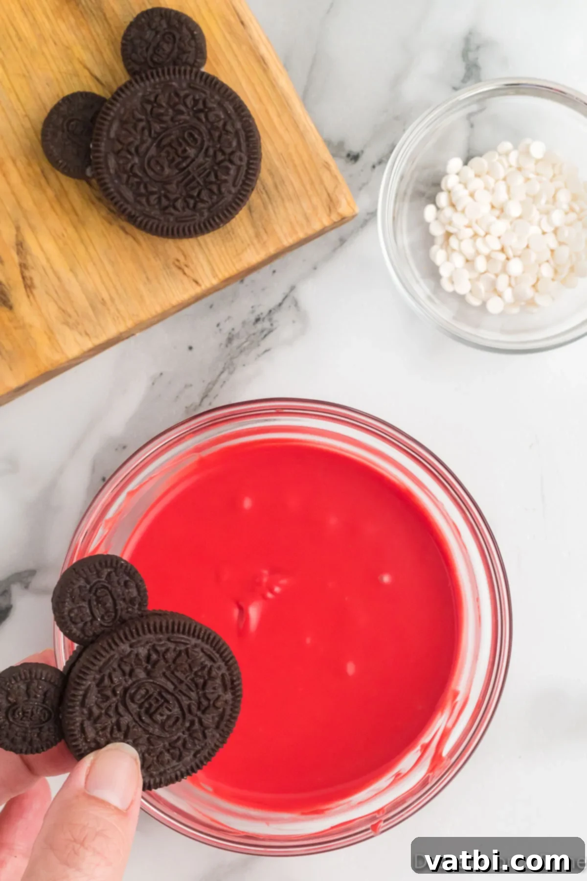 Disney Mickey Mouse Oreo Treats 7 Red candy melts in bowl melted and ready to dip.