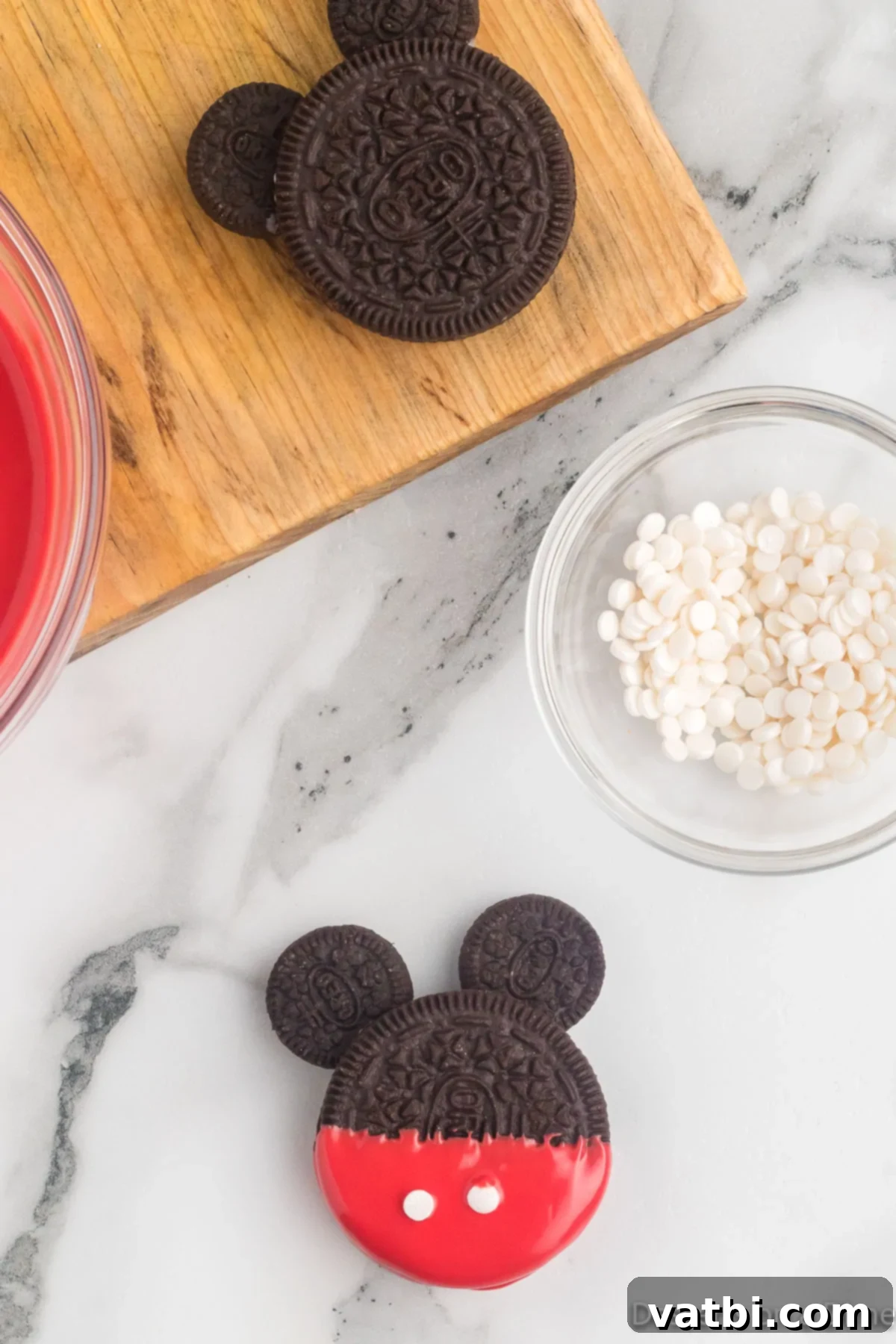 Disney Mickey Mouse Oreo Treats 8 Cookie dipped into red candy melts and topped with sprinkles.