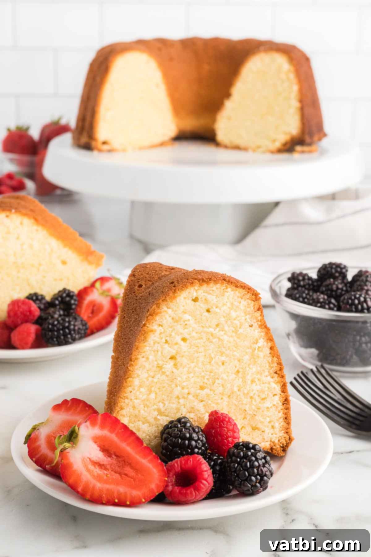 How to Freeze Pound Cake for Lasting Freshness 2 Pound cake on a serving platter.