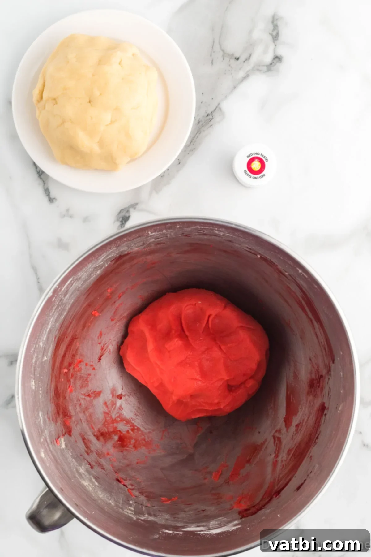 Twisted Peppermint Delights 6 Mixing bowl with red dough.