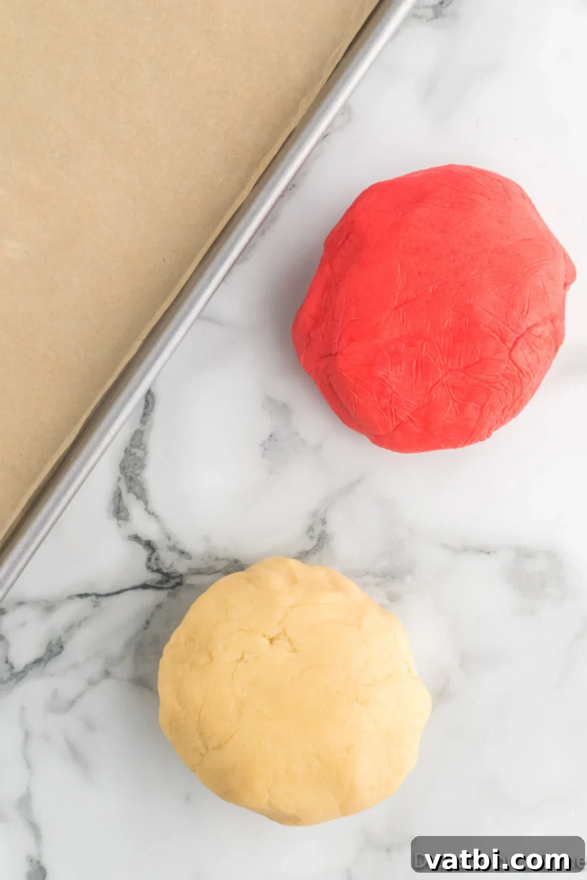 Twisted Peppermint Delights 7 Ball of red dough and white dough.