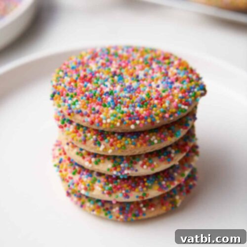 Colorful Mexican Sprinkle Cookies (Galletas de Grageas) arranged on a plate, perfect for festive occasions.
