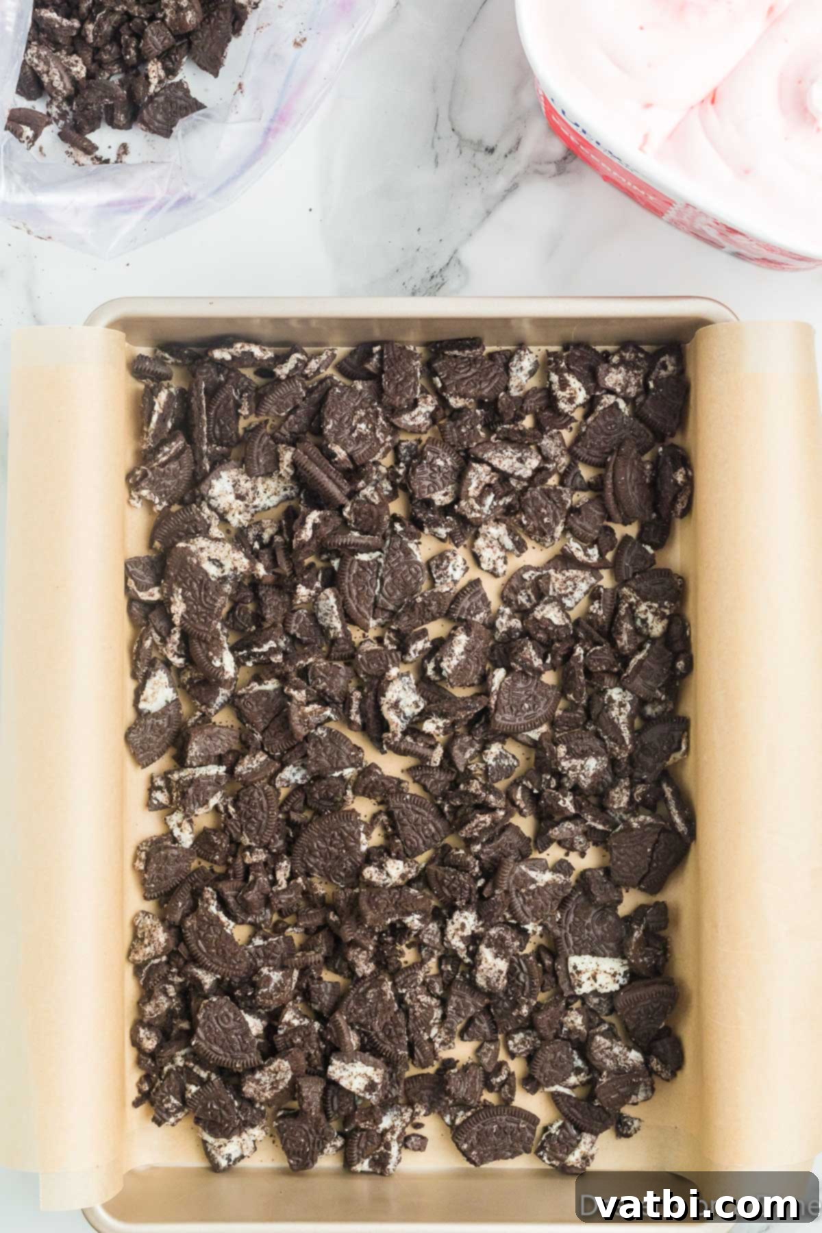 Festive Christmas Ice Cream Cake 6 Cookies in bottom of pan.