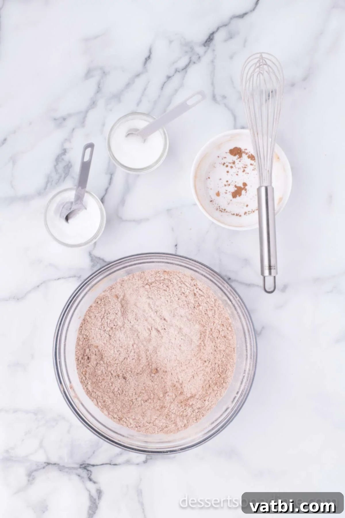 Dry ingredients whisked together in a bowl. 