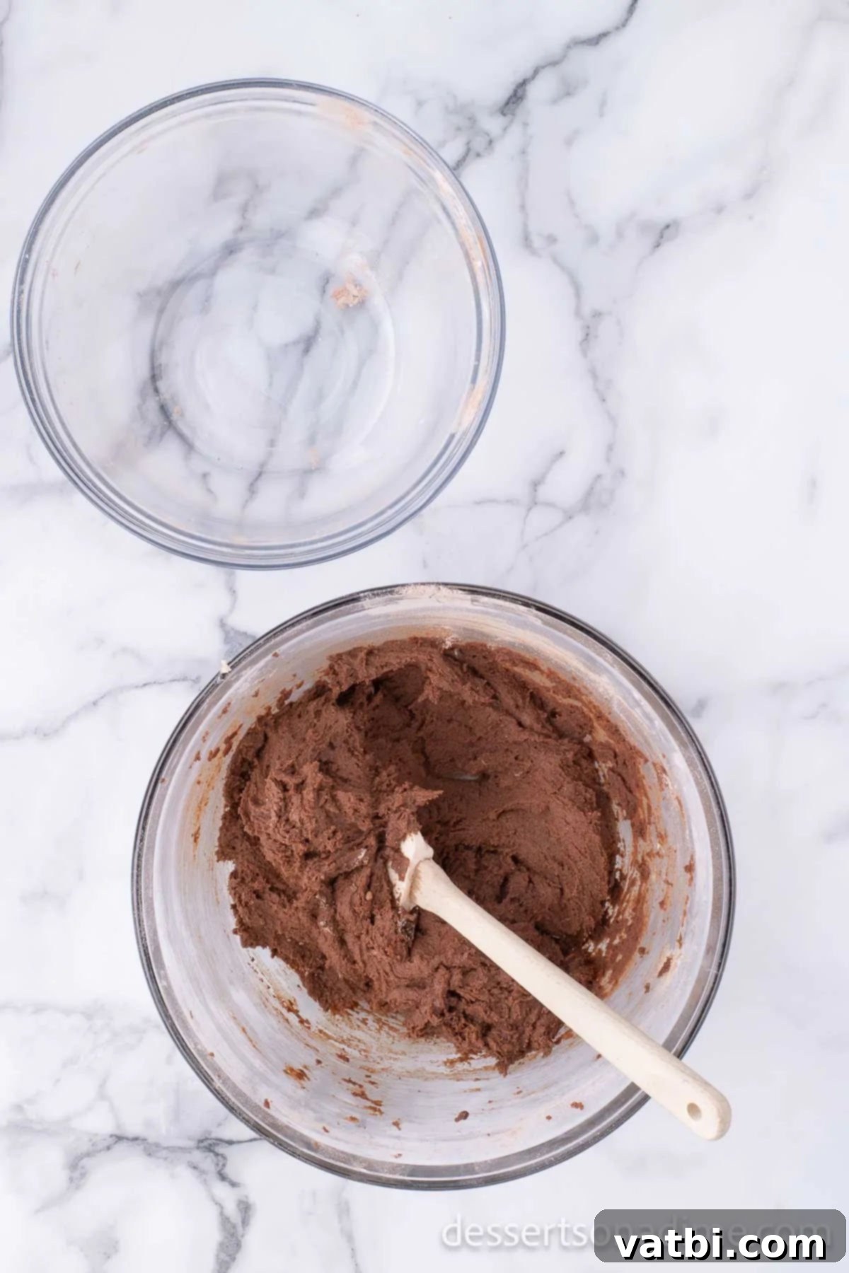 Mixing bowl with wet and dry ingredients combined. 
