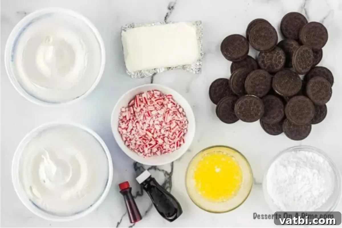 This creamy candy cane pie recipe is loaded with the best peppermint filling and oreo pie crust. Each bite of this easy no bake treat is light and fluffy. Try this tasty treat at Christmas or year round for an amazing chocolate treat. #dessertonadime #candycanepierecipe #copycat #nobake Ingredients needed to make this easy Candy Cane Pie: Oreo cookies, butter, cream cheese, powdered sugar, red food coloring, peppermint extract, Cool Whip, and candy canes.