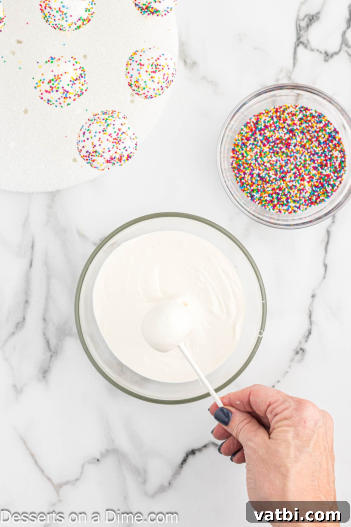 Mastering the Art of Cake Pops 9 Cake pops dipped into melted candy melts.