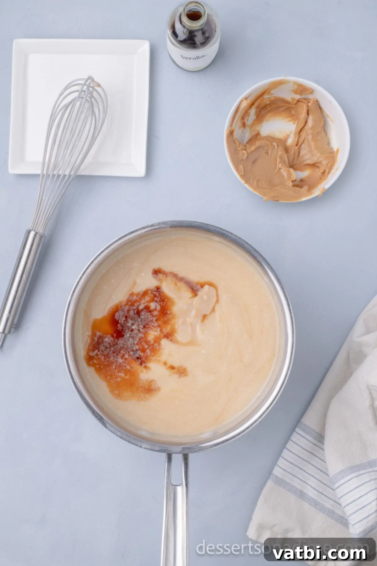 Creamy Peanut Butter Delight 7 Mixture combined together in pan.