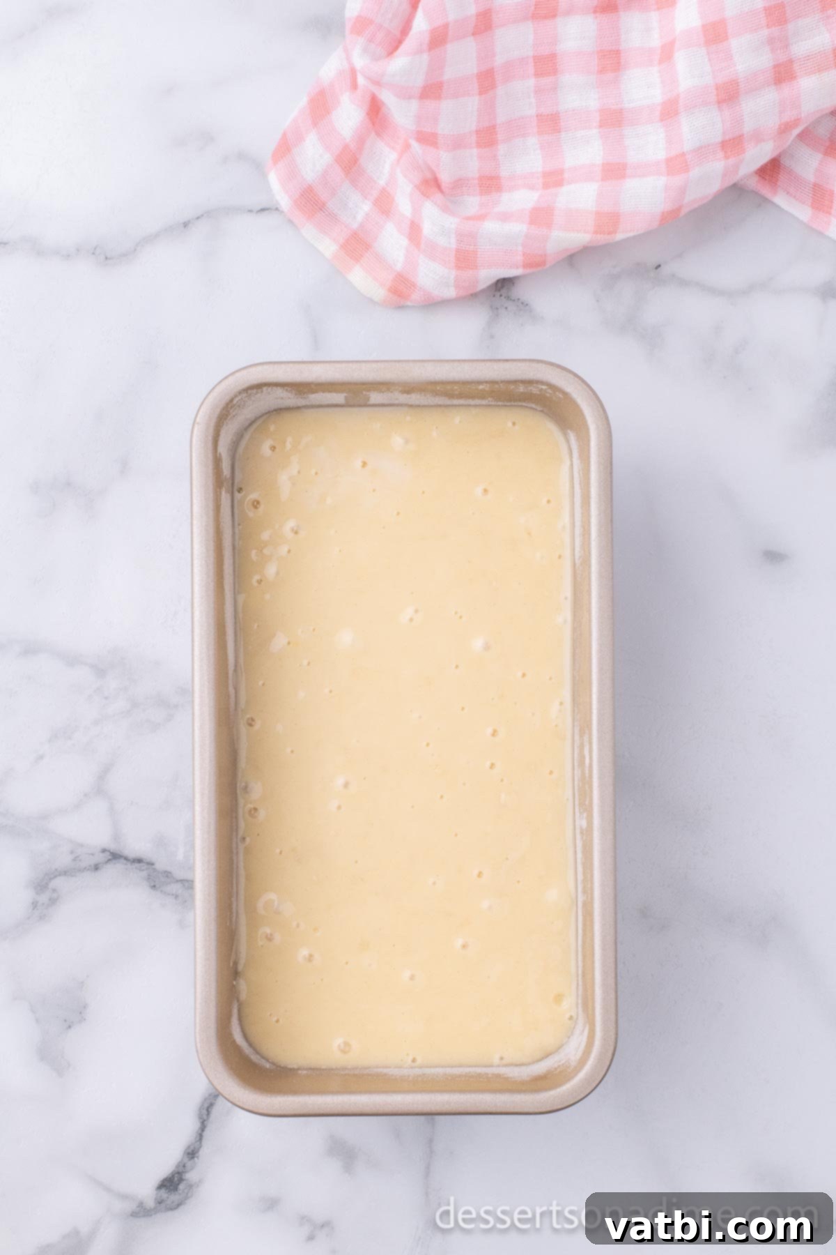 Sweet Temptations 7 Loaf pan with batter.
