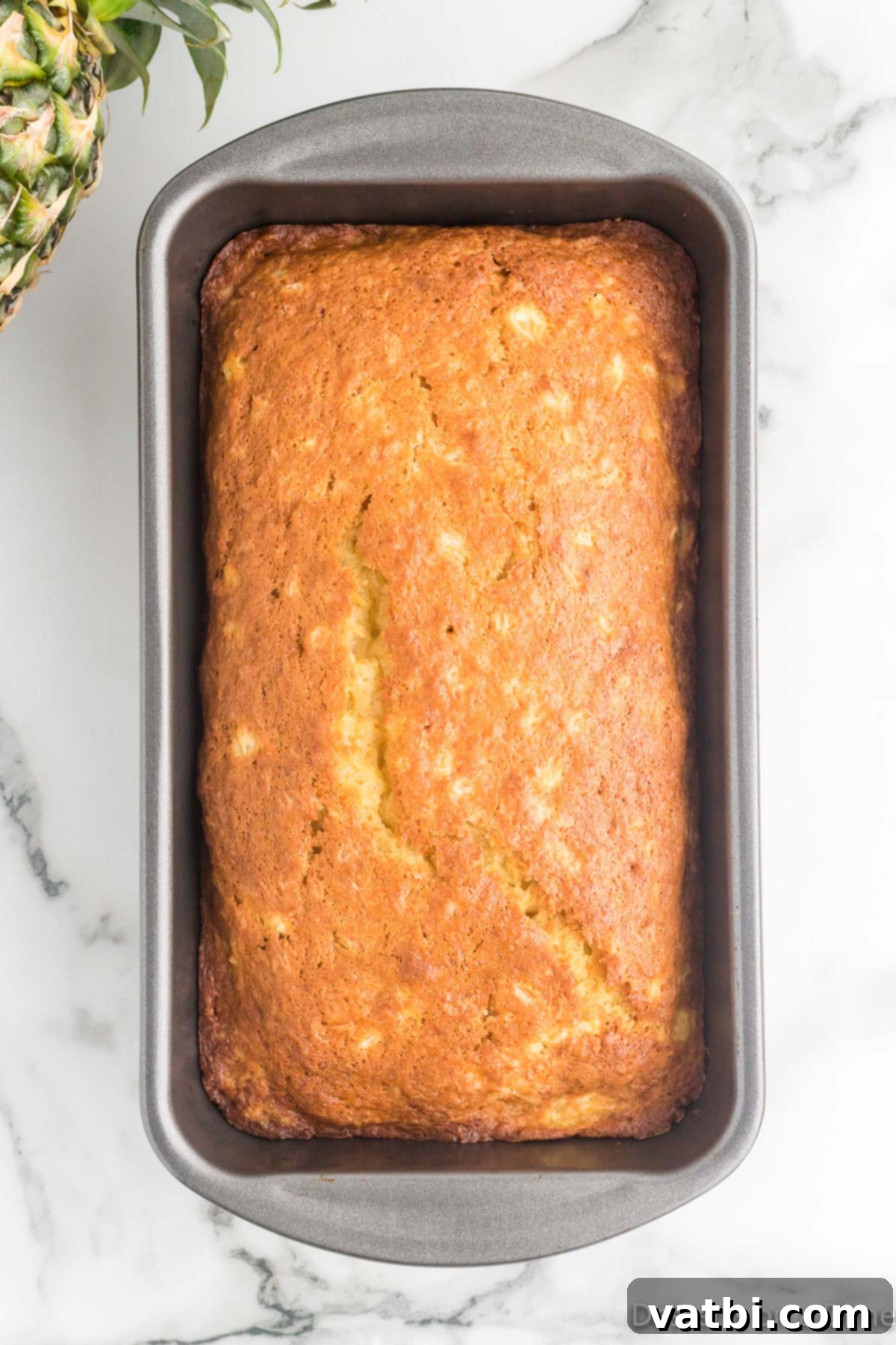 Tropical Pineapple Bread 11 Bread in pan cooling.