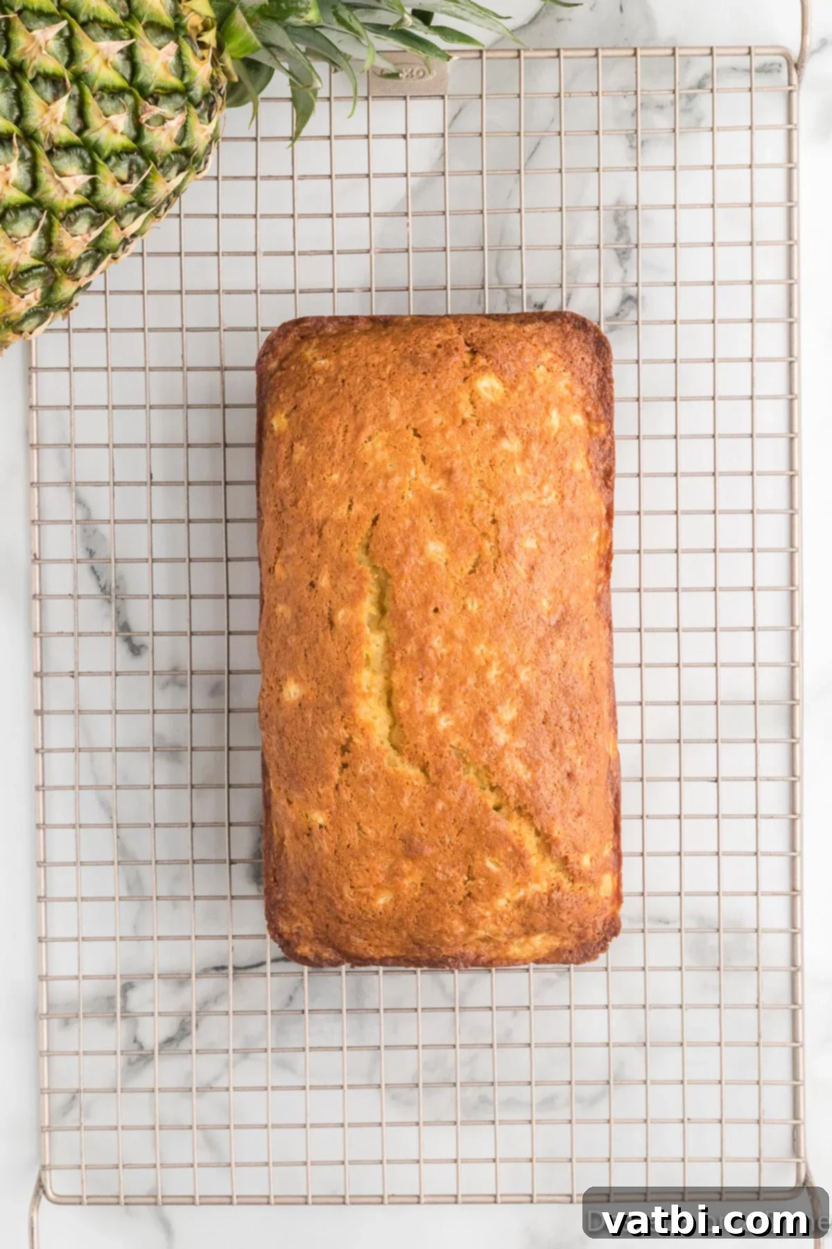 Tropical Pineapple Bread 12 Bread on wire rack.