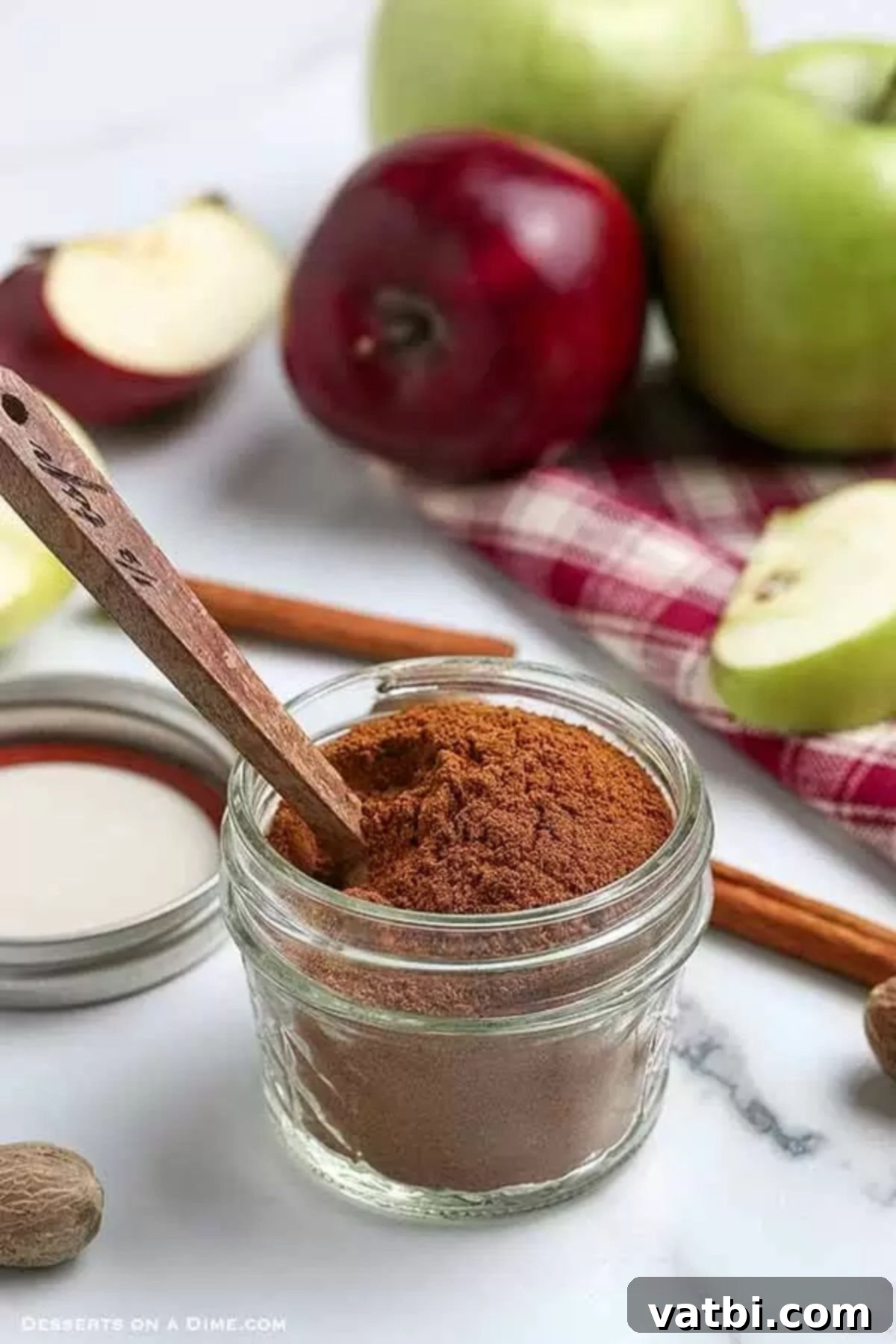 Learn how to make Apple pie spice mix recipe at home and save money. Homemade apple pie spice is so easy to make and only takes a few minutes. Try homemade apple pie spice mix recipe without cardamom today.#dessertonadime #applepiespicerecipe #homemade A mason jar filled with the finished apple pie spice blend, ready for storage or use.
