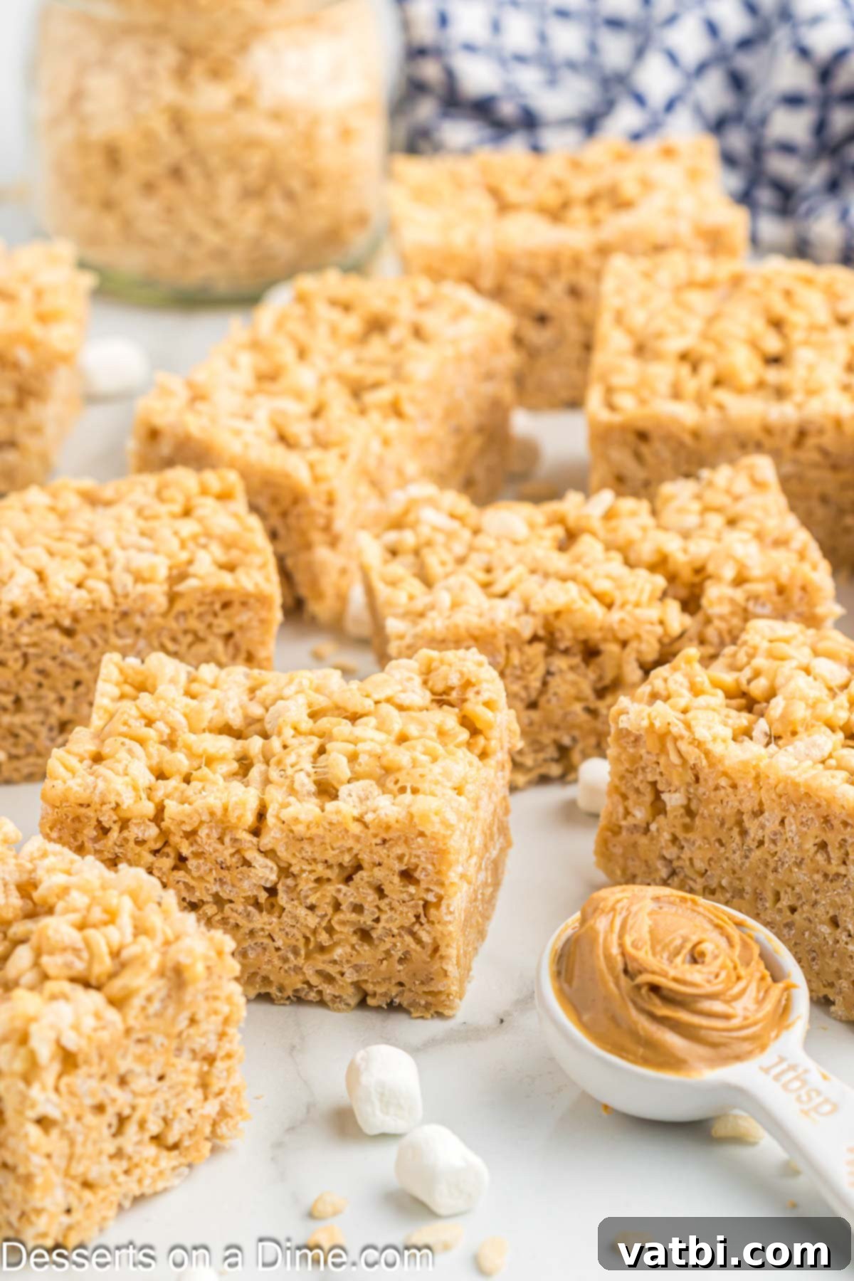 Chewy Peanut Butter Rice Krispie Treats 3 Peanut Butter Rice Krispy Treats cut into perfect squares, ready to be served.
