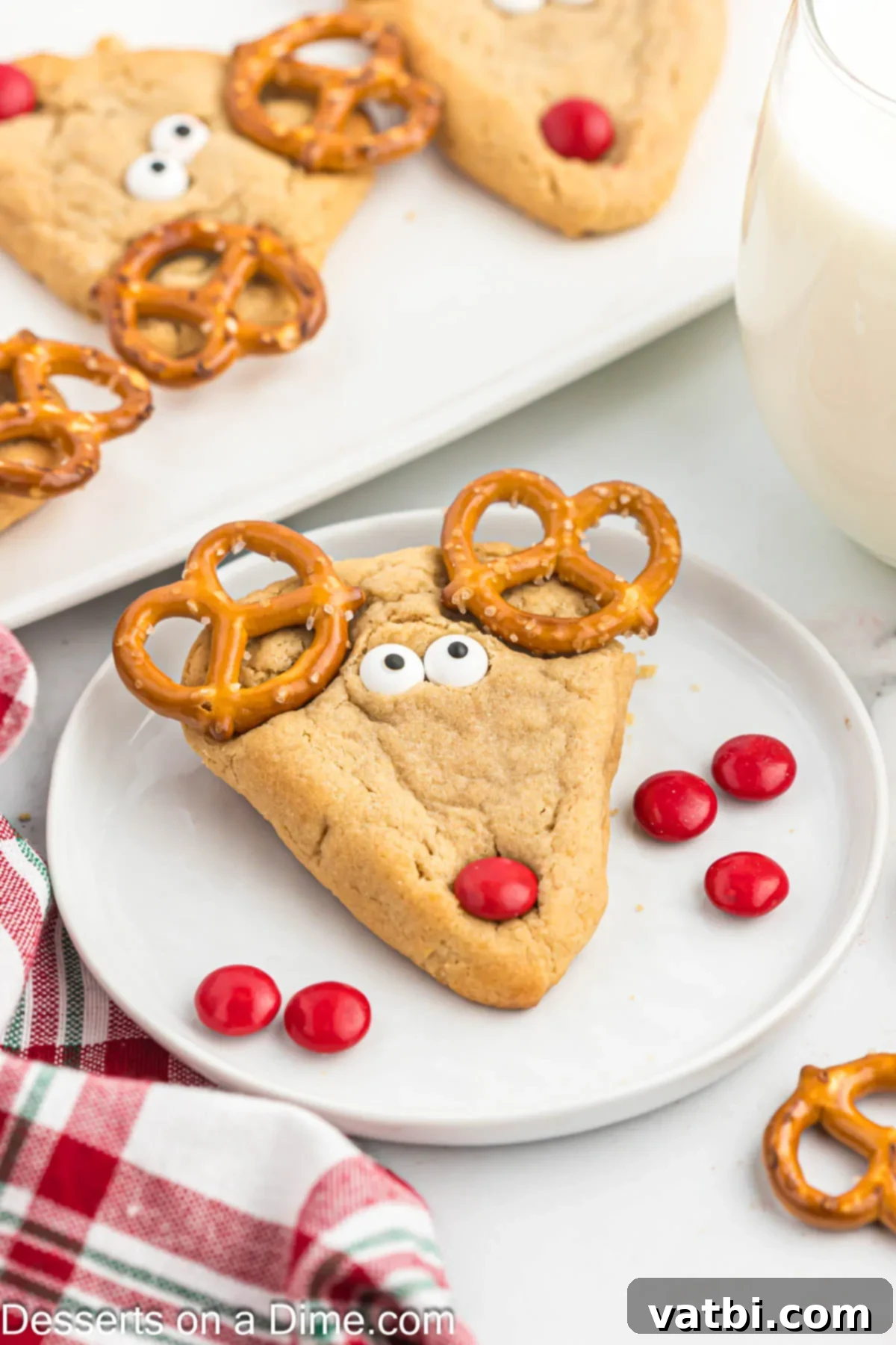 Holiday Reindeer Delights 10 Close-up of a single reindeer cookie on a plate, highlighting its cute details and texture.