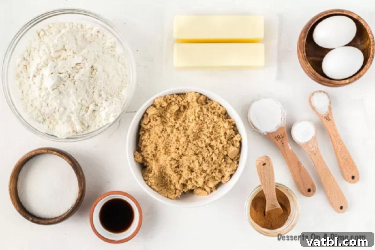 You probably already have what you need to make this easy Brown sugar cookie recipe. These cookies are soft and chewy and simply amazing. Learn how to make the best homemade brown sugar cookies recipe. This cookie dough is simple and perfect for Christmas. #dessertonadime #BrownSugarCookies #RecipeEasy #cinnamon #lightf #simple A selection of baking ingredients: softened butter, light brown sugar, eggs, all-purpose flour, baking soda, cornstarch, salt, ground cinnamon, vanilla extract, and granulated sugar.