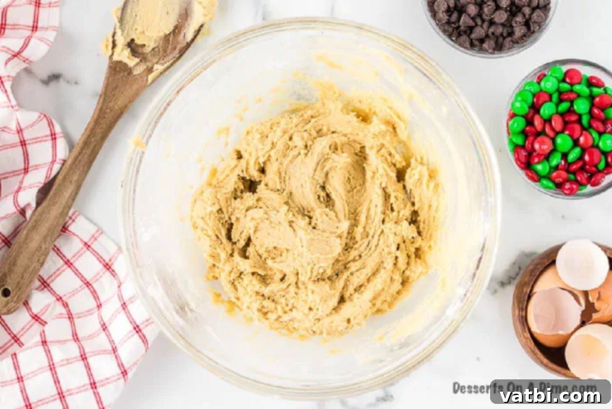 Effortless Christmas Cookies for Santa 2 Butter and sugar in a bowl being combined.