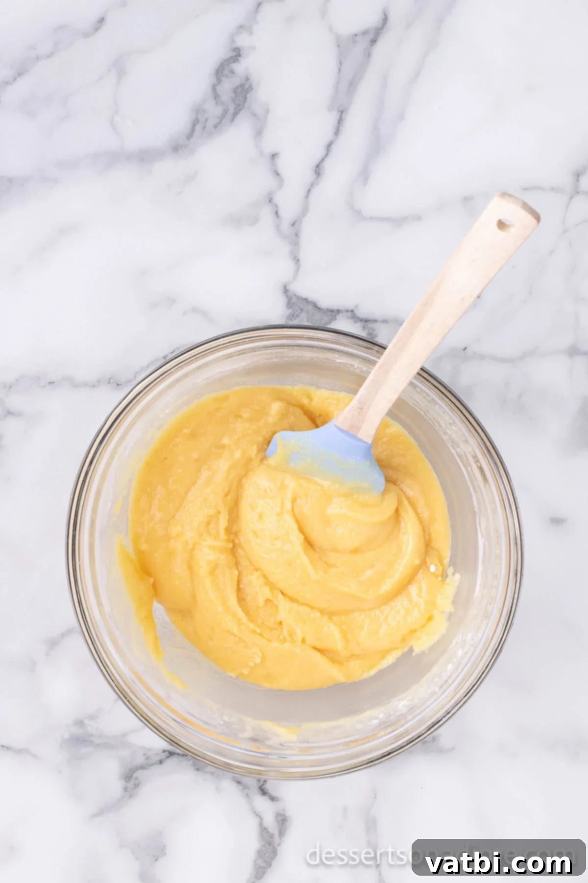 Effortless Slow Cooker Peach Delight 6 Melted butter added to cake mix.