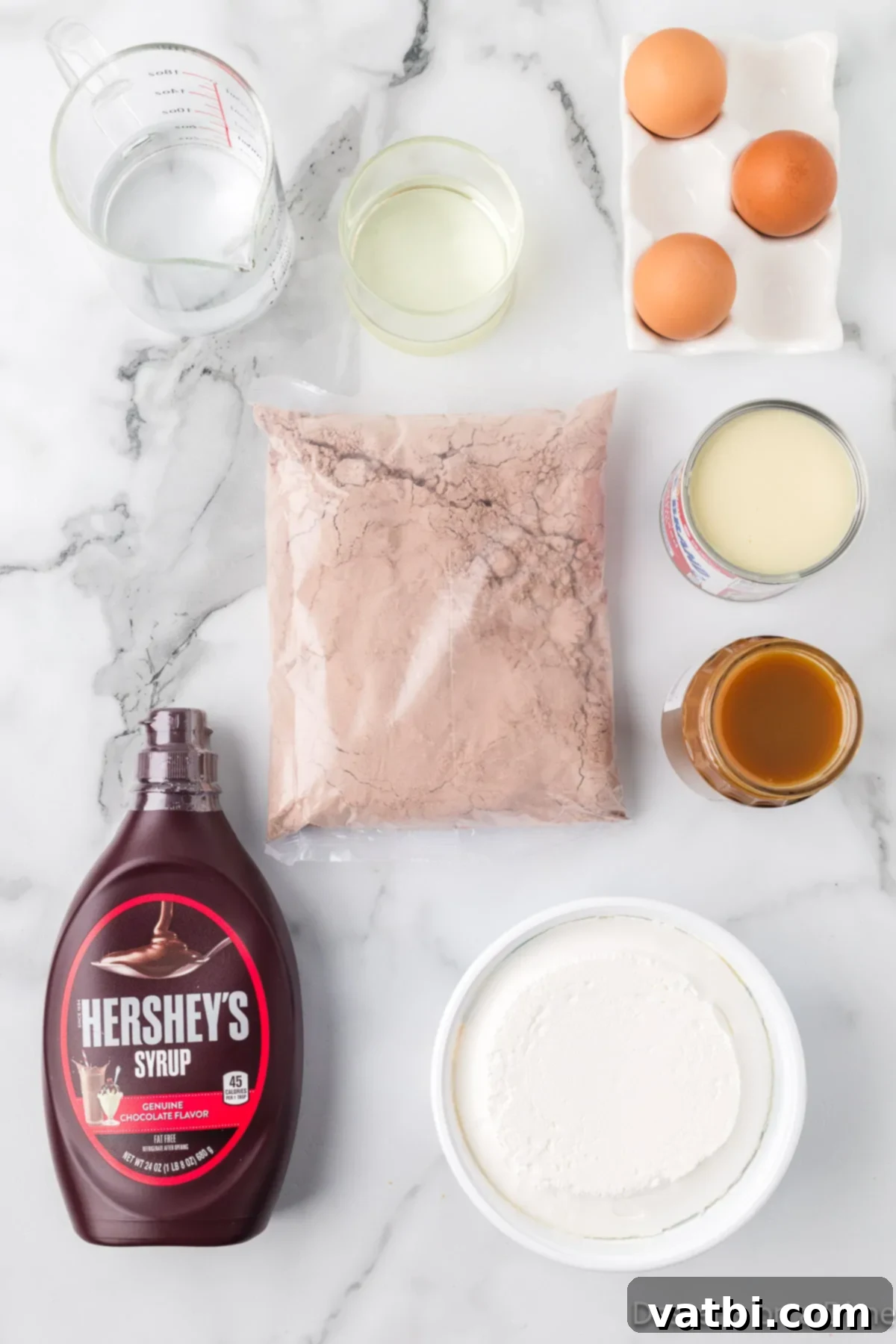 Liquid Gold Chocolate Poke Cake 3 Ingredients for recipe - cake mix, eggs, oil, sweetened condensed milk, chocolate syrup, cool whip.