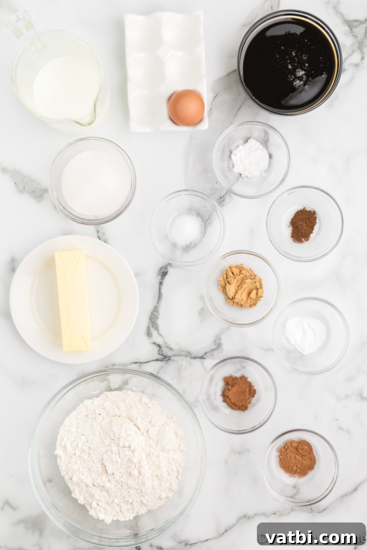 Key Ingredients for Delicious Homemade Gingerbread Cake Ingredients for super moist gingerbread cake: flour, baking powder, baking soda, salt, ginger, cinnamon, nutmeg, cloves, butter, molasses, sugar, egg, buttermilk, whipped cream, powdered sugar
