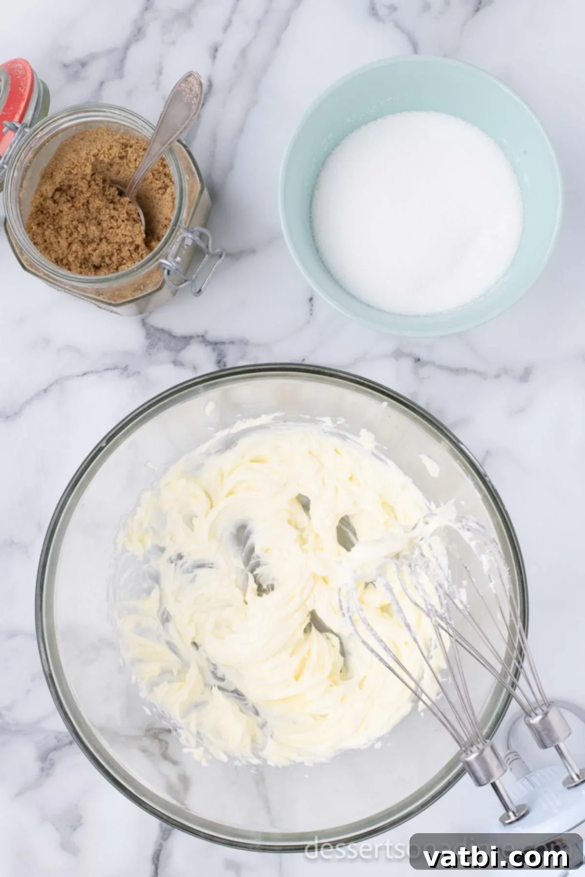 Love-Filled Chocolate Chip Hearts 4 Softened butter, granulated sugar, and brown sugar creaming in a mixing bowl.