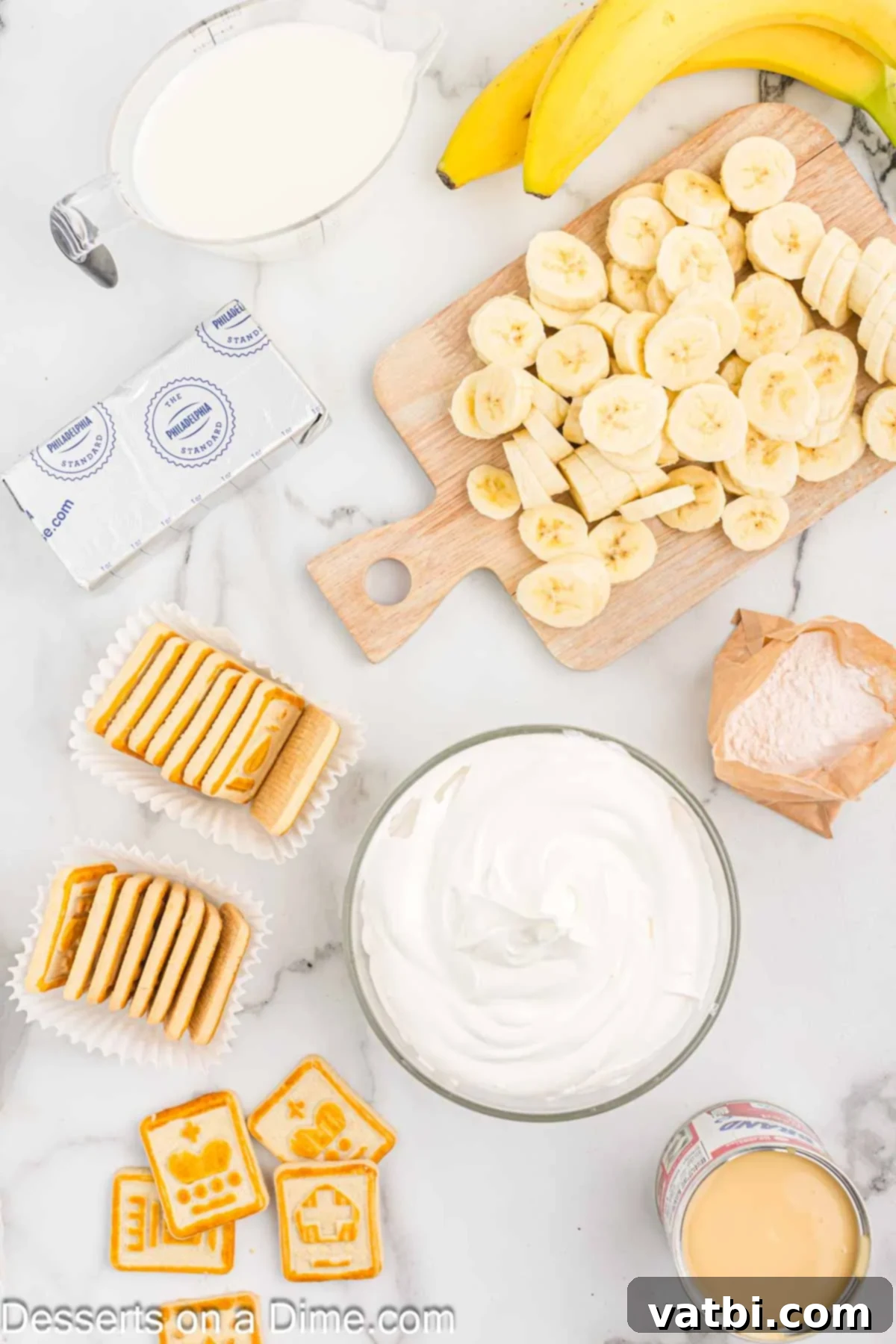 Ingredients for Paula Deen Banana Pudding: sweetened condensed milk, whipped topping, cream cheese, milk, instant pudding mix, fresh bananas, and Chessmen cookies.