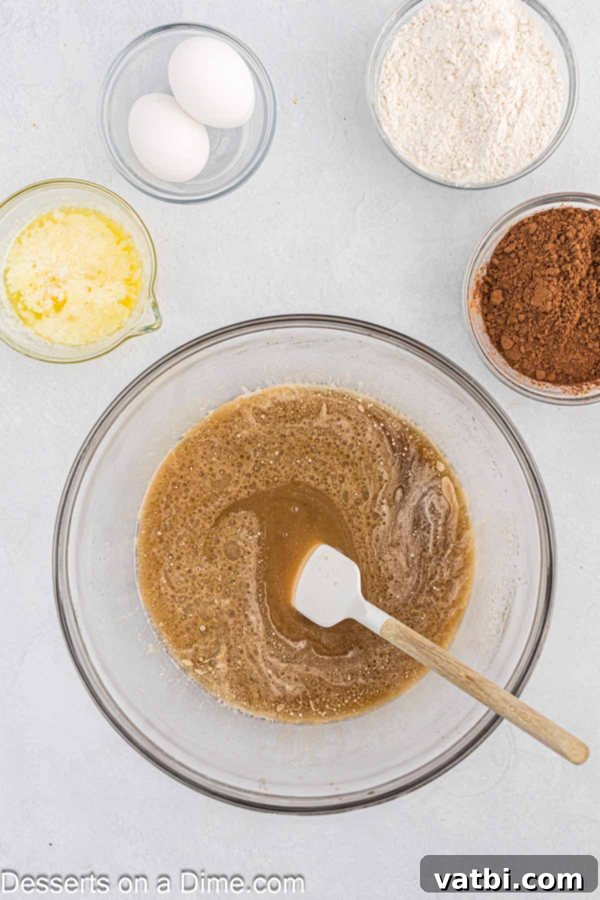 Rich Guinness Chocolate Brownies 4 Mixing bowl with vegetable oil, granulated sugar, and vanilla extract combined.