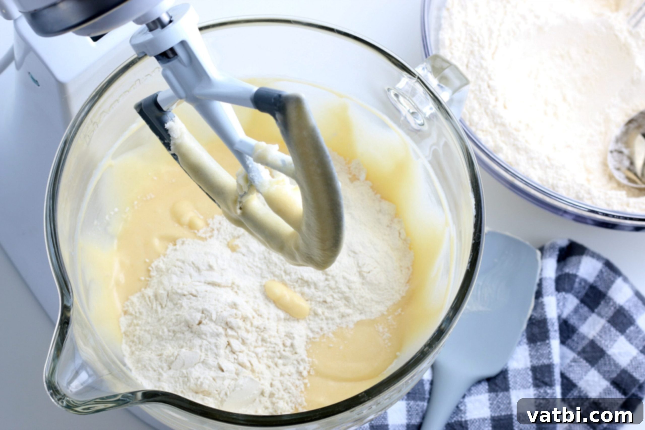 Flour mixed into wet ingredients and combined. 