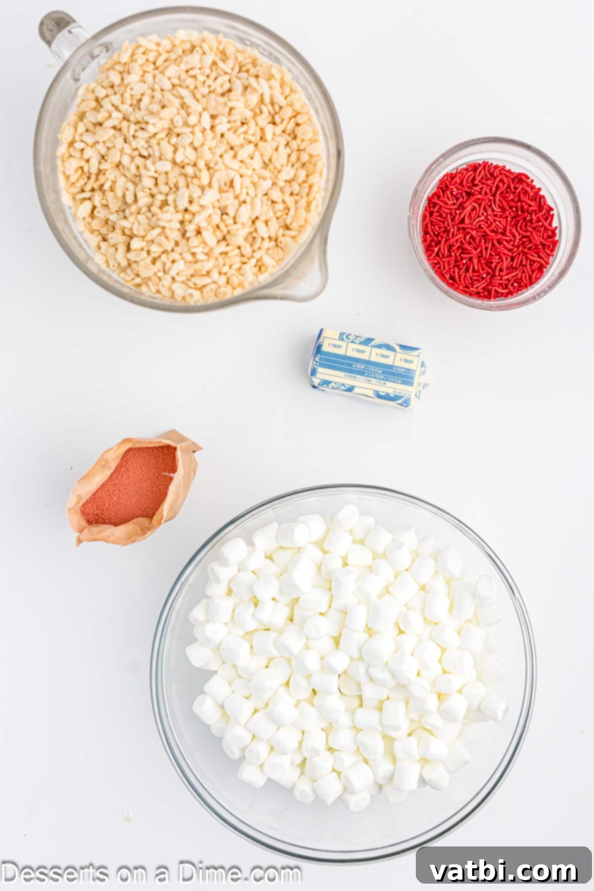 Ingredients for recipe- rice krispie cereal, sprinkles, butter, marshmallows and jello. 