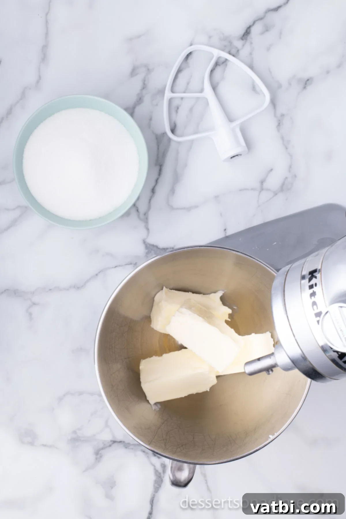 Effortless Pound Cake Perfection 2 Mixing bowl with softened unsalted butter, ready for creaming.