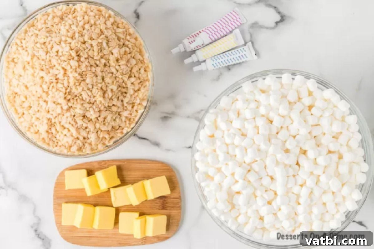 Simple ingredients for festive Easter Egg Rice Krispie Treats. Key ingredients for Easter Egg Rice Krispie Treats: mini marshmallows, butter, Rice Krispie cereal, and assorted food coloring