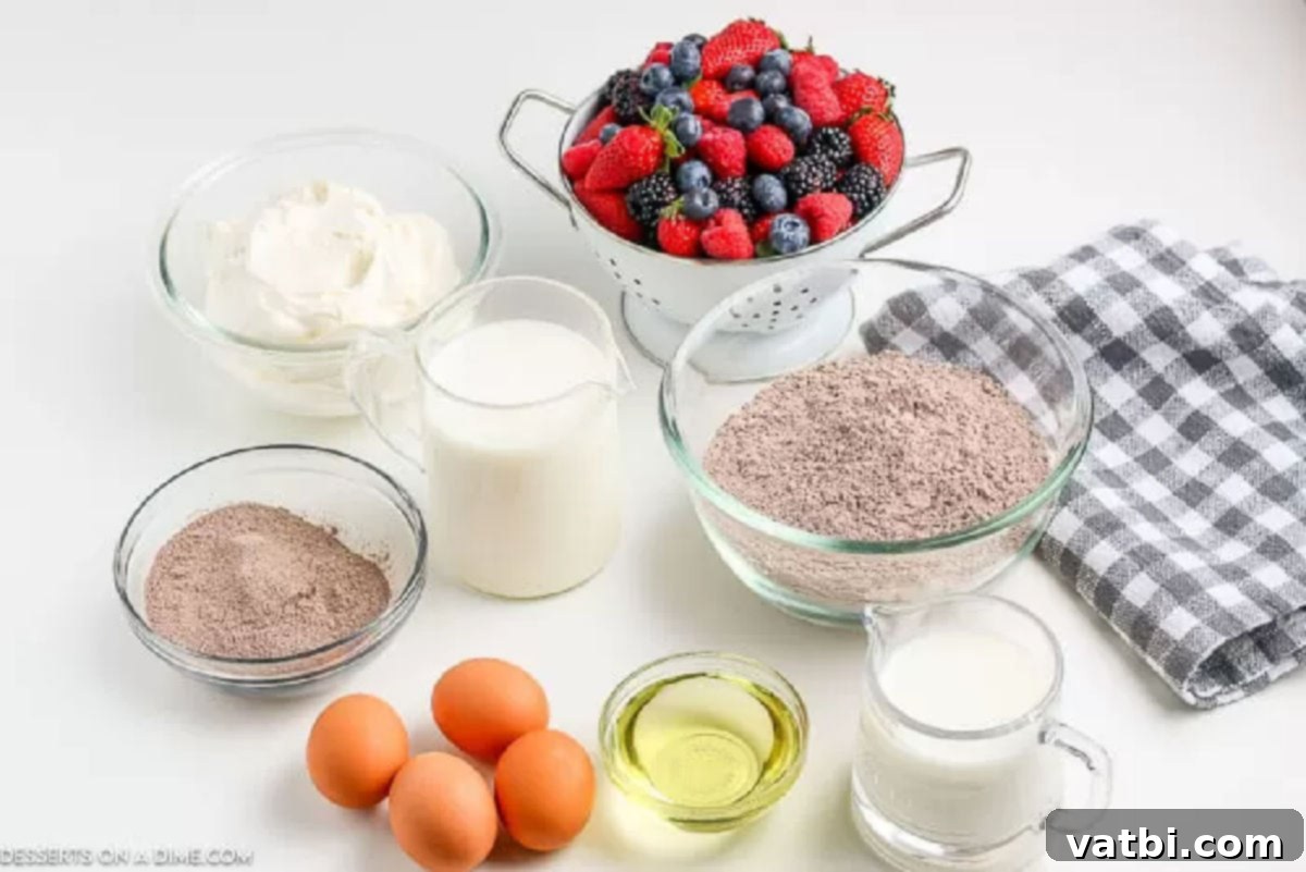 Gather your ingredients for the best triple chocolate trifle: chocolate cake mix, fresh eggs, vegetable oil, buttermilk (or milk/water), instant chocolate pudding, cold milk, thawed whipped topping, and optional decadent toppings like caramel sauce, Heath candy, or fresh fruit. #trifleingredients #chocolatetrifle #easybaking All the ingredients neatly laid out for a chocolate trifle: chocolate cake mix box, fresh eggs, bottle of vegetable oil, carton of buttermilk, instant chocolate pudding box, carton of milk, tub of whipped topping, bottle of caramel sauce, various candy pieces, and fresh berries.
