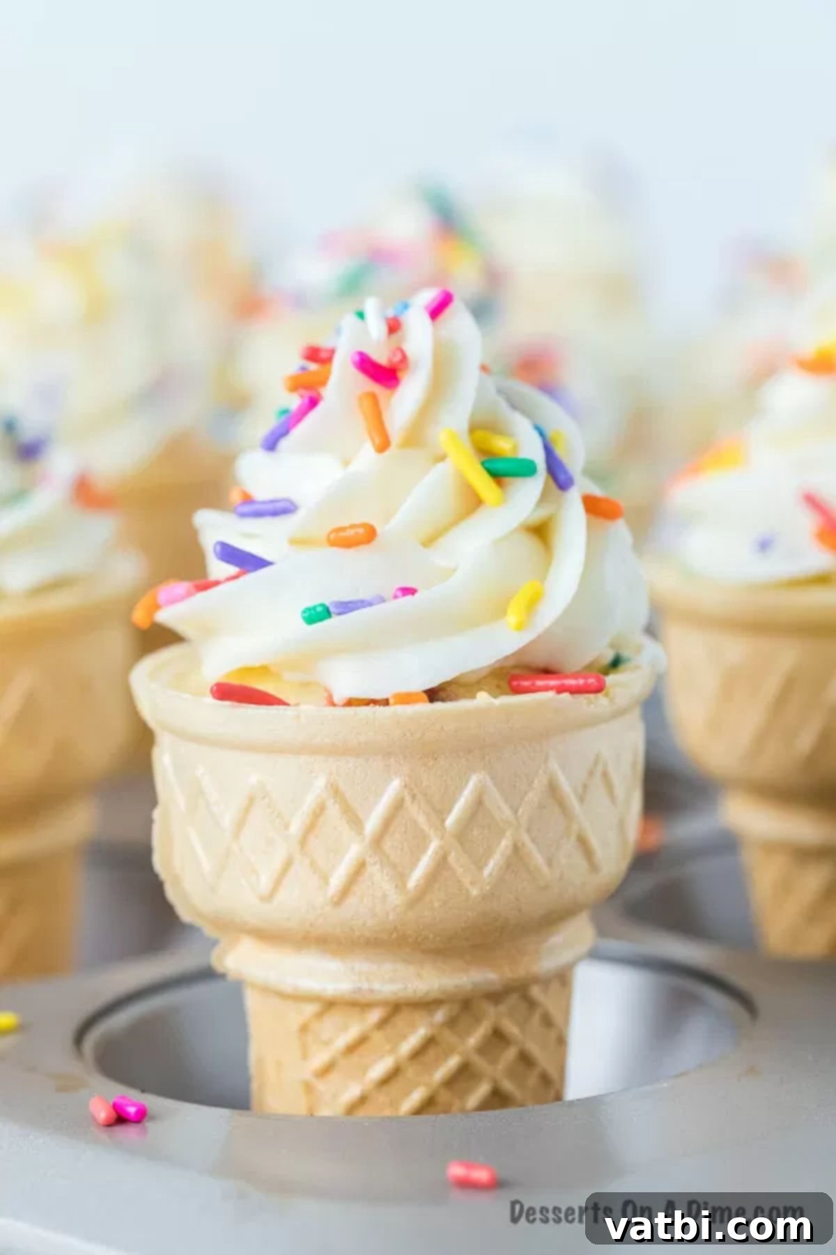 My kids go crazy over Ice cream cone cupcakes. They are so fun and festive. We have the best tips and tricks to make this tasty recipe. Ice Cream Cone Cupcakes in a muffin pan